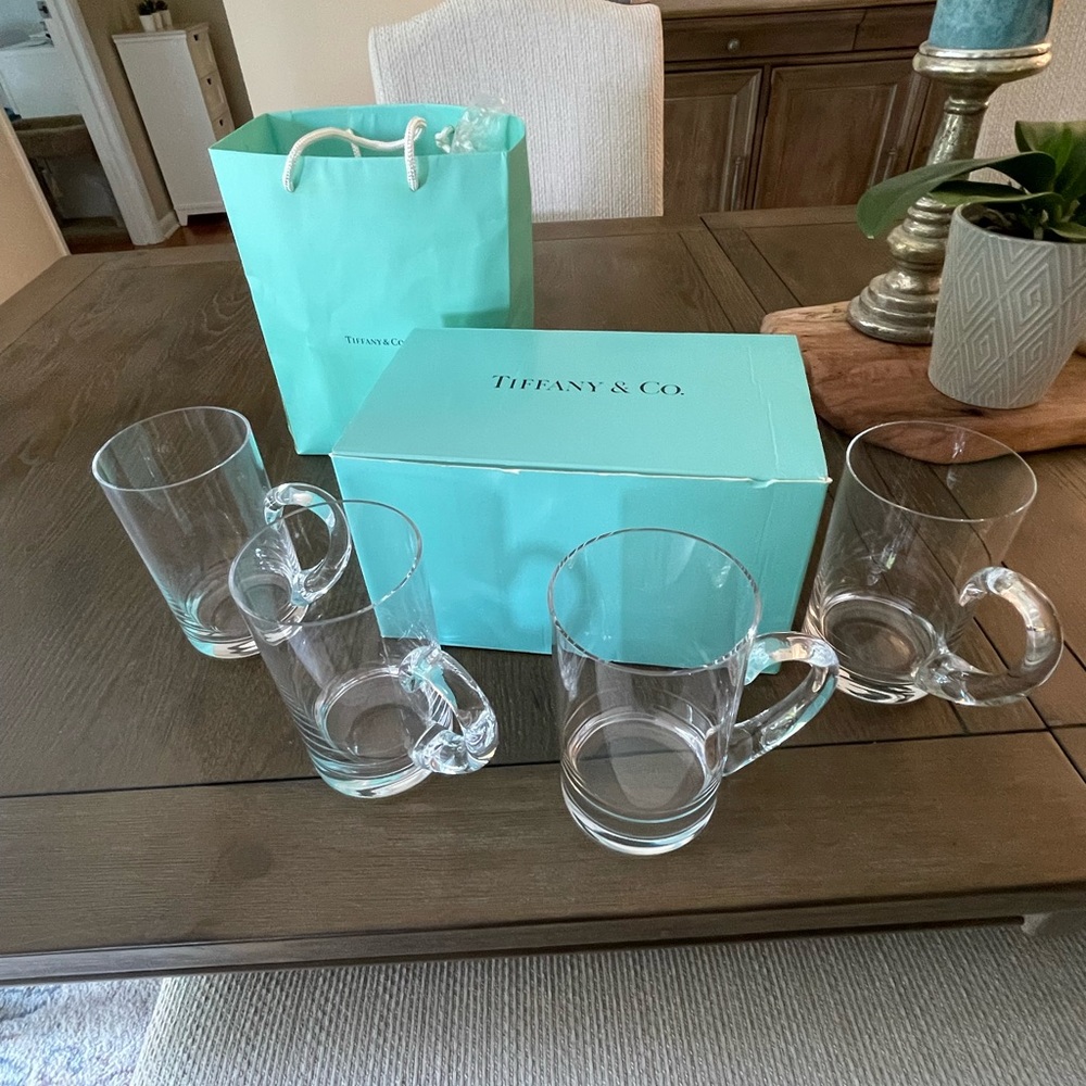 A set of 4 Tiffany Crystal Glasses, stamped logo on bottom of each.